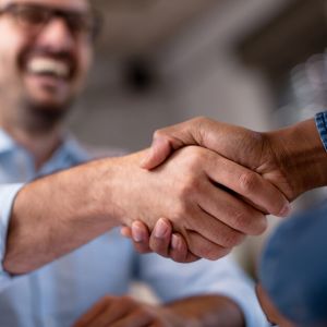 shaking hands with a disability lawyer