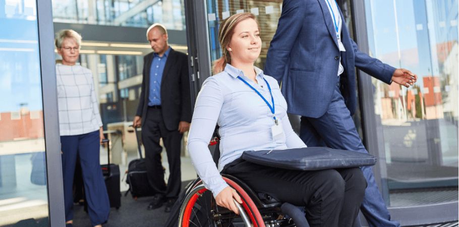 Woman in the workforce in a wheelchair - The Law Offices Of Justin Frankel